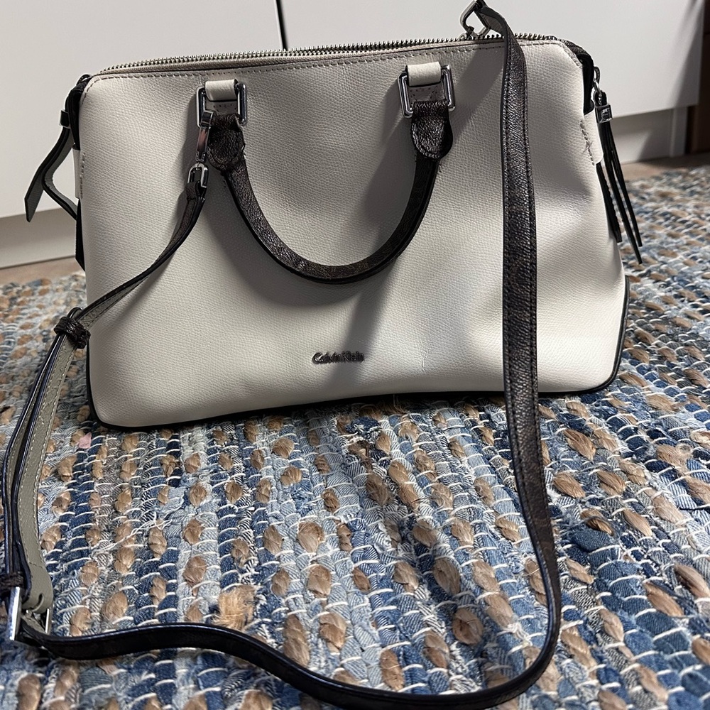 Calvin Klein cream and brown handle with strap